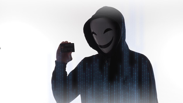 Credit cards personal data stolen by anonymous man in Black hood shirt