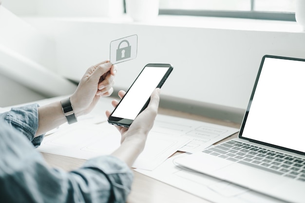 Cropped hands using technologies while working in office