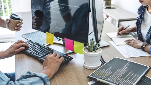 Cropped image of business people working in office