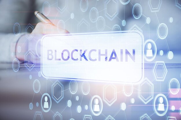 Cryptocurrency hologram over womans hands writing background Concept of blockchain Multi exposure