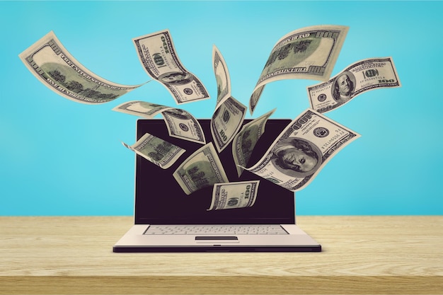 currency computer electronic banking internet laptop making