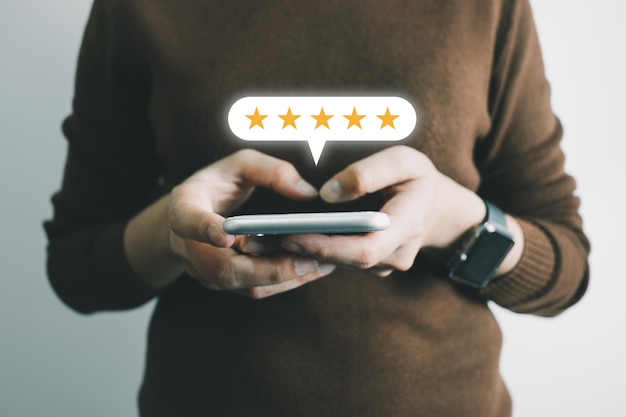 Customer assess service satisfaction 5 stars by smartphone