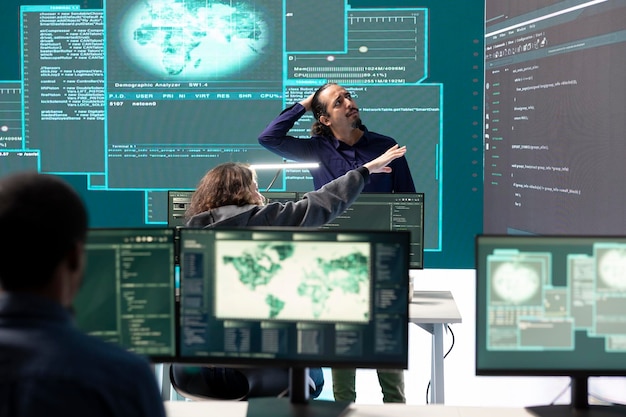 Cyber operations center with governmental hackers working on digital security