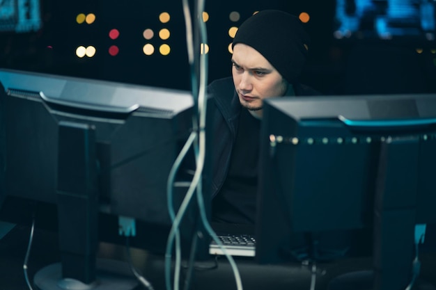 dangerous hooded hacker breaks into government data servers and infects their system