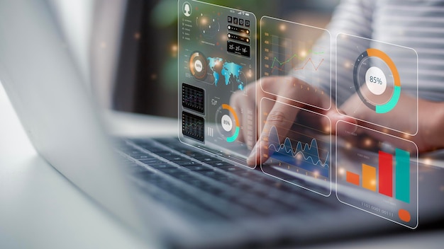 Data scientists a programmer using a laptop to analyze and develop various information on a futuristic virtual interface screen Algorithm marketing and deep learning of artificial intelligence