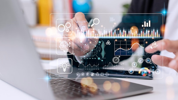 Data scientists Man programmer using laptop analyzing and development at various information on futuristic virtual interface screen Algorithm marketing and deep learning of artificial intelligence