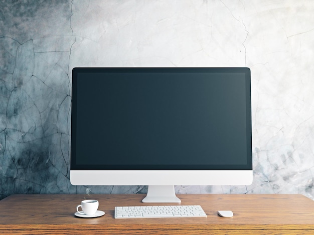 Designer desktop with blank computer