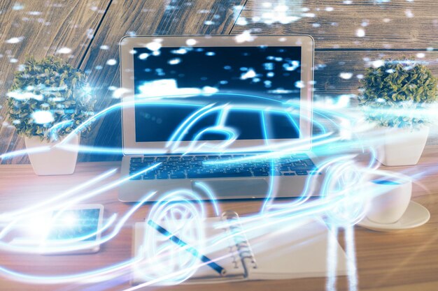 desktop computer background in office with automobile hologram drawing multi exposure tech concept