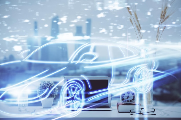 Desktop computer background in office with automobile hologram drawing Multi exposure Tech concept