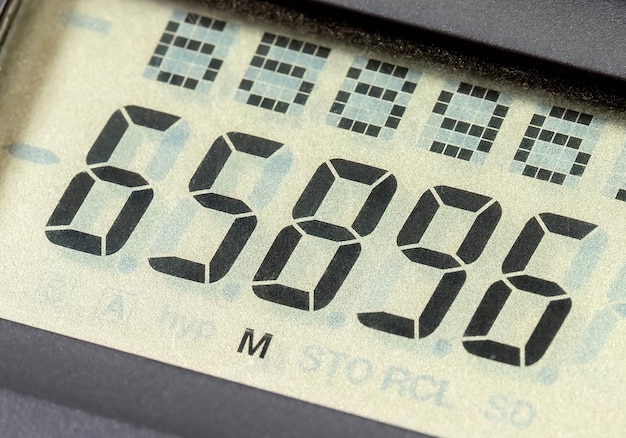 Detailed closeup macro detail shot of a digital display showing different random numbers representing a number sequence Digital computer memory number representation digits abstract concept nobody