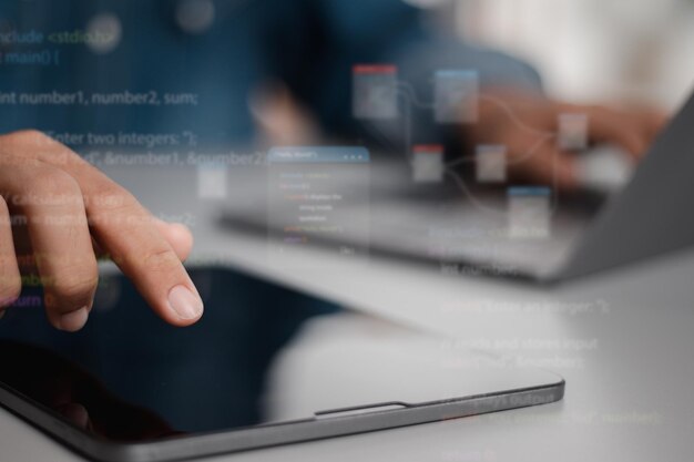 Developer of digital software technology programming a laptop computer running computer coding Development of websites or applications