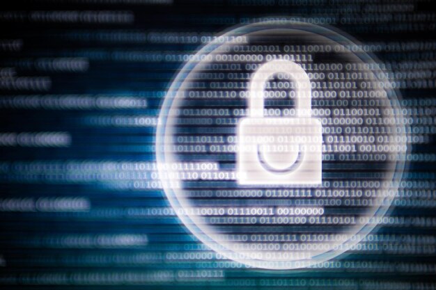 Digital composite image of lock with binary codes on screen