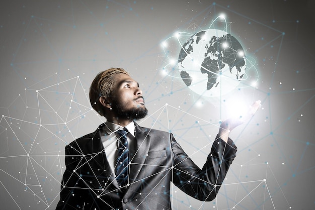 Digital composite image of man gesturing on globe