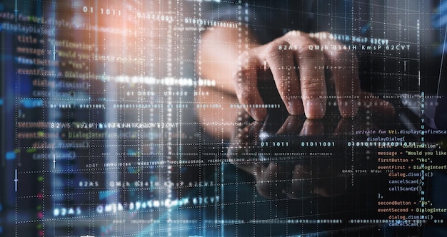 Digital technology big data storage digital software development cyber security concept Software engineer programmer using computer with data centre javascript computer code