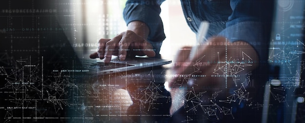 Digital technology data engineering and exchanging internet network connection concept Computer programmer using smart phone and laptop big data internet technology background
