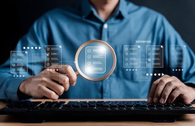 Document Management Checking System online documentation database and process manage files Magnifier check and focus to document folder documentation Corporate business technology concept