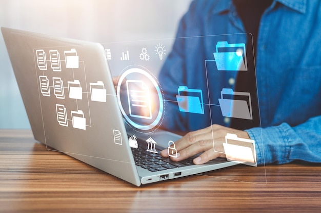 document management concept businessman using computer to document management concept online documentation database and digital file storage system or software records keeping database technology