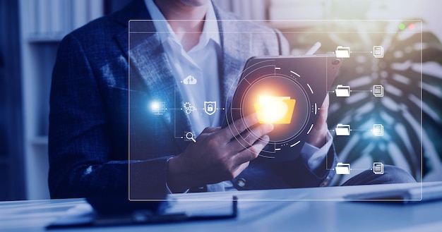 Document management system concept business man holding folder and document icon software searching and managing files online document database for efficient archiving and company data