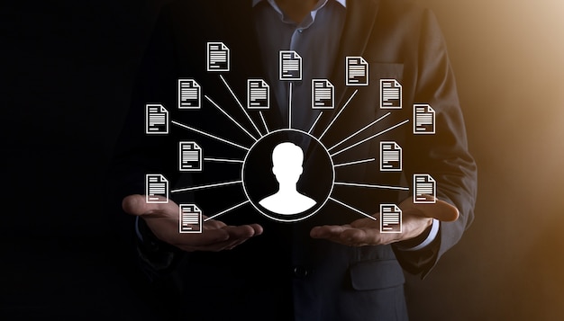document management system dms .businessman hold user and document icon.software for archiving, searching and managing corporate files and information.internet technology concept.digital security.