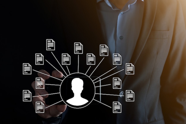 document management system dms .businessman hold user and document icon.software for archiving, searching and managing corporate files and information.internet technology concept.digital security.