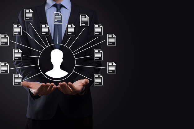 Document Management System DMS Businessman hold user and document iconSoftware for archiving searching and managing corporate files and informationInternet Technology ConceptDigital security