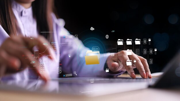 Document management system DMS Enterprise content management Businessman working on laptop