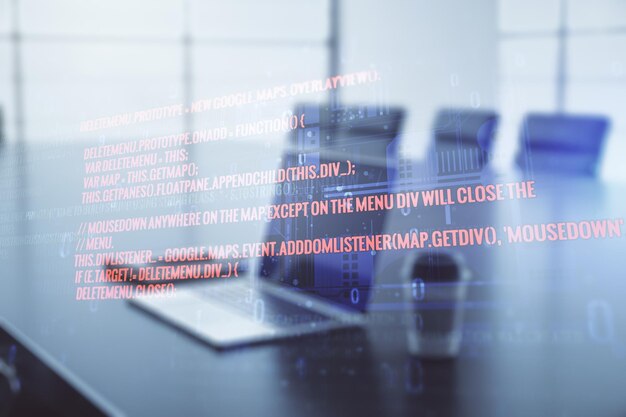 Double exposure of abstract programming language on laptop background research and development concept