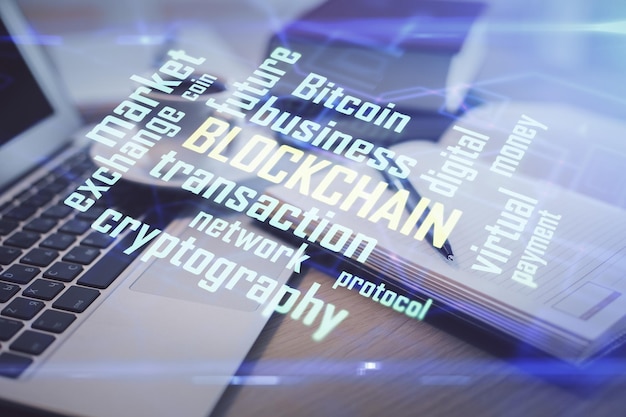 Double exposure of crypto technology drawing and desktop with coffee and items on table background Concept of blockchain