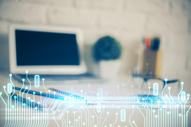 double exposure of desktop computer and technology theme hologram concept of software development
