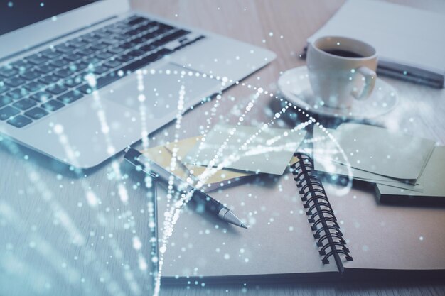 Double exposure of DNA drawing and desktop with coffee and items on table background Concept of medical science education