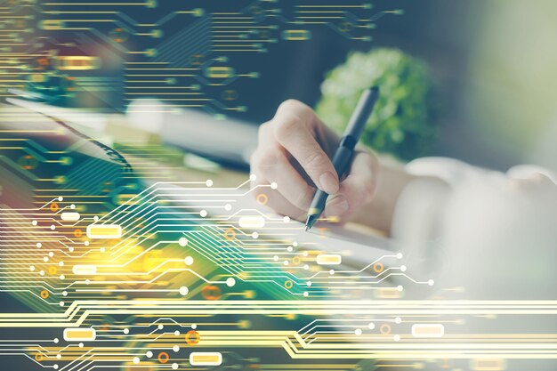 double exposure of hands making notes background with technology and digital coding huds data learning concept