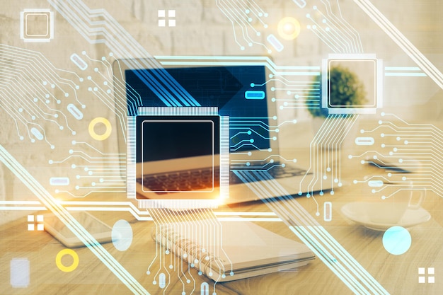 Double exposure of laptop computer and technology theme hologram Concept of freelance work