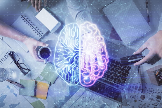 Double exposure of man and woman working together and human brain hologram drawing Brainstorm concept Computer background Top View