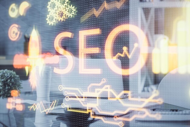 Double exposure of SEO drawing and office interior background Concept of Search optimization engine