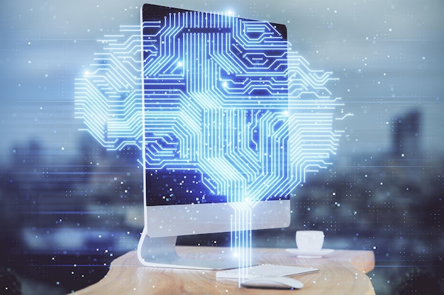 Double exposure of table with computer and brain hologram Data innovation concept
