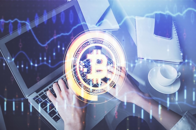 Double exposure of woman hands typing on computer and crypto market theme hologram drawing Blockchain concept