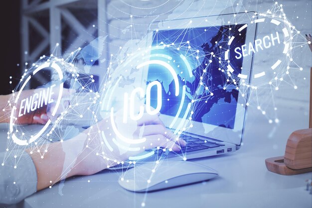 Double exposure of woman hands typing on computer and crypto market theme hologram drawing Blockchain concept