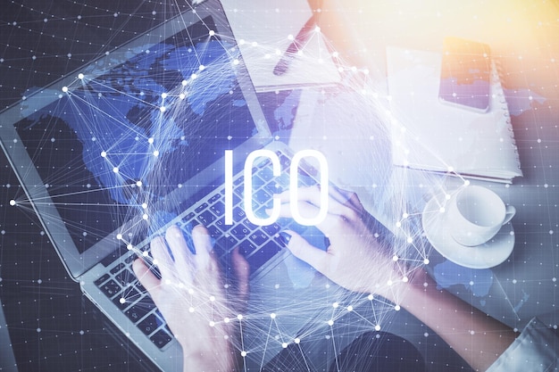 double exposure of woman hands typing on computer and crypto market theme hologram drawing blockchain concept
