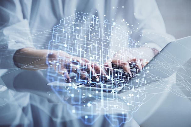 Double exposure of woman hands working on computer and brain hologram drawing Ai concept