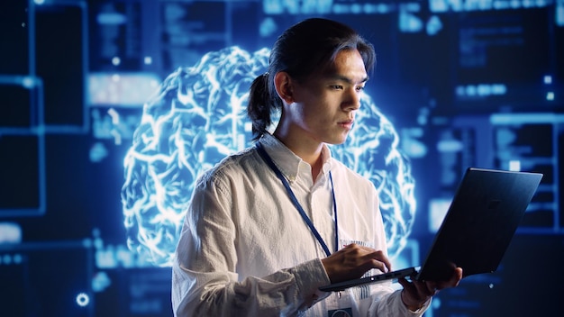 Expert doing AI simulation on laptop