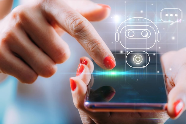 Female hand engaged in a chatting conversation with an automated digital chatbot