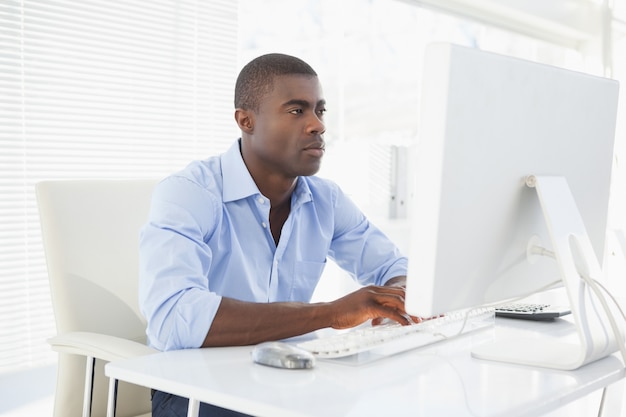 Focused businessman working at his desk