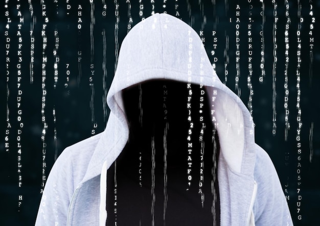 Foreground of grey jumper hacker with out face