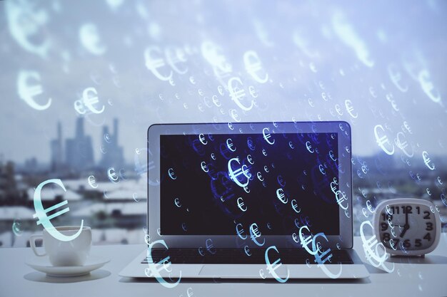Forex graph hologram on table with computer background Multi exposure Concept of financial markets