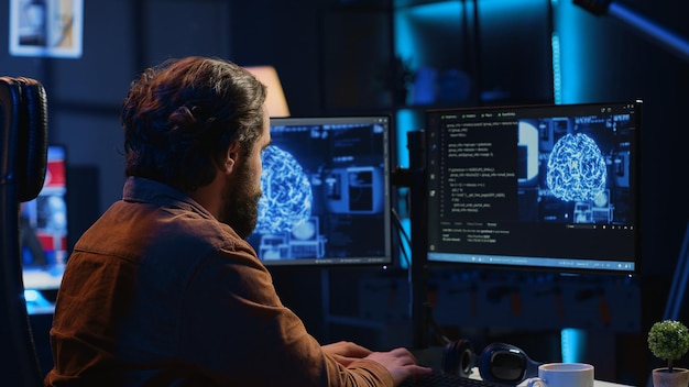 Freelancing IT specialist writing AI code training machine learning