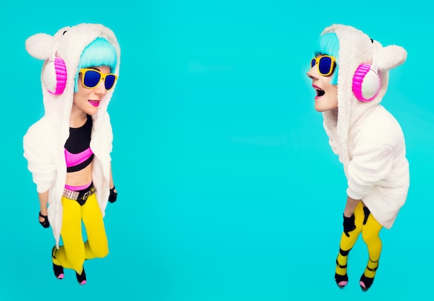 Funny DJ Girls Sweatshirt Teddy Bear in a blue background listening to music. Crazy winter party