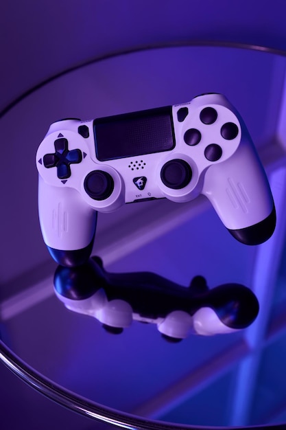 Gamepad on abstract background with light effects