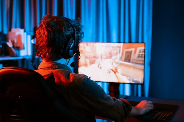 Gaming streamer team playing battle game shooting at back side image gusher
