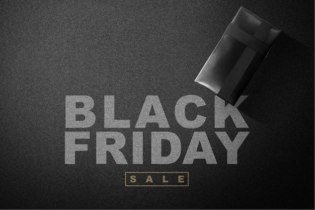gift box with black ribbon and black friday sale text