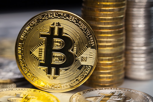 Gold bitcoin on a dark background